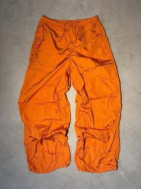 TNA Orange Nylon Parachute Cargo Joggers with Bungee Cord Details